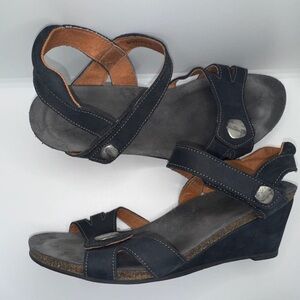 Taos Footwear Charade Black Sandals with Wedge Heel